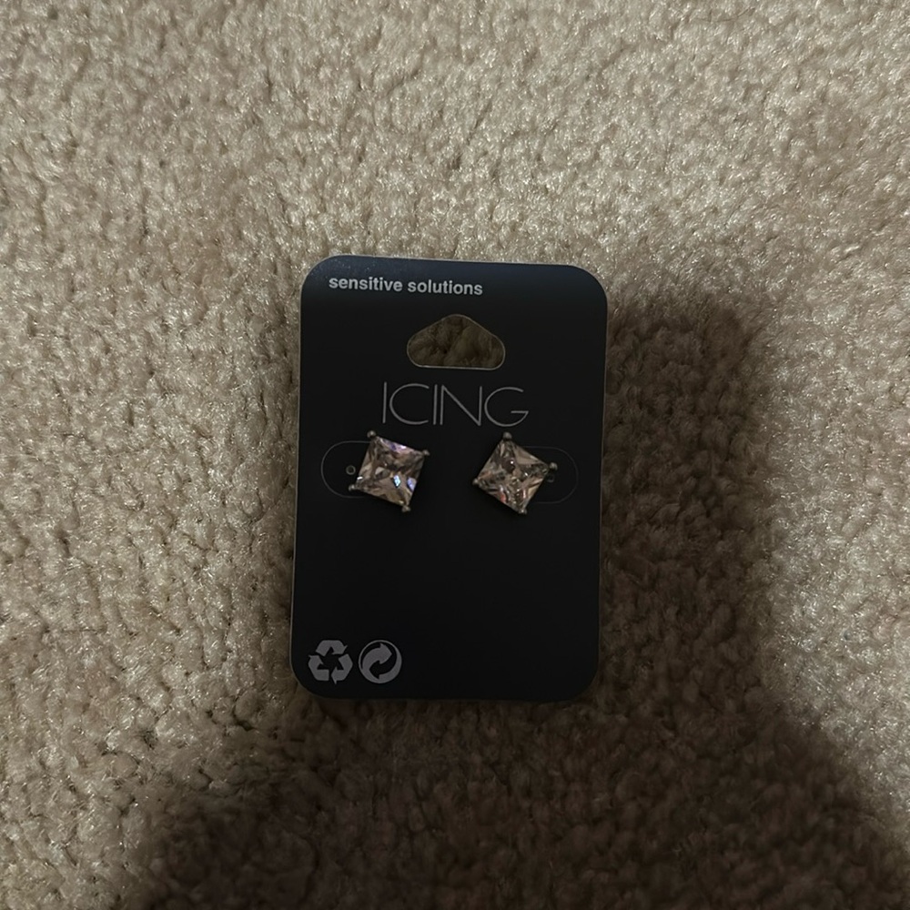 Cute earrings in the brand icing